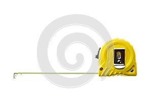 Close up new yellow measuring tape isolated on white