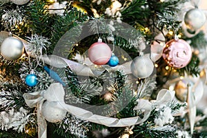 Close up of newyear tree with different ornaments. Festive christmas background