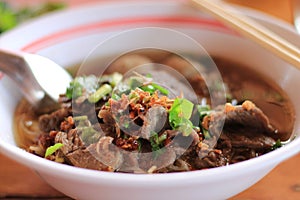 Close-up of noodle soup on table in the restuarant. photo