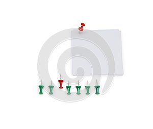 Close up of a note paper with push pin on white background