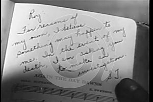 Close-up of note written on music sheet