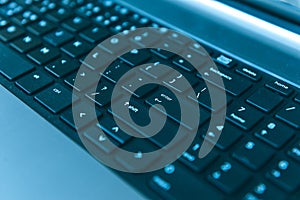 Notebook computer keyboard. selected focus on enter button