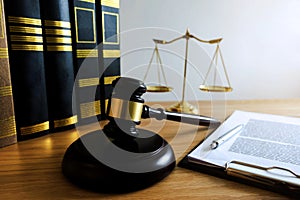 Close up object  law concept. Judge gavel with justice lawyers and documents working on table