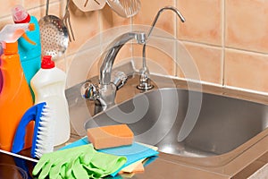 close-up objects in the kitchen - faucet, sink and cleaning