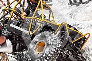 Close-up of off-road 4x4 stunt buggy car during competition