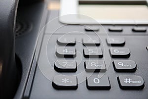 Closeup of a office telephone buttons business wallpaper