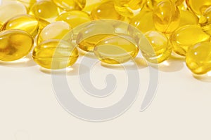 Close up of  oil filled capsules suitable for: fish oil, omega 3, omega 6, omega 9,  vitamin A, vitamin D, vitamin D3, vitamin E