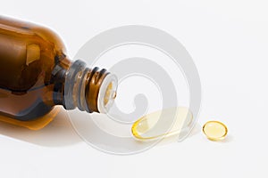 Close up of  oil filled capsules suitable for: fish oil, omega 3, omega 6, omega 9,  vitamin A, vitamin D, vitamin D3, vitamin E