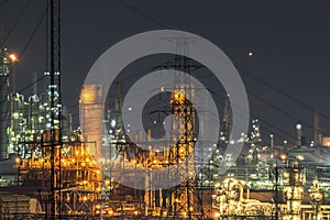 Close up of Oil and gas refinery plant at twilight.