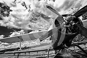Close up of old airplane in black and white
