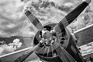 Close up of old airplane in black and white photo