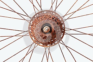 Close up of Old bicycle gear rusted object isolated on white