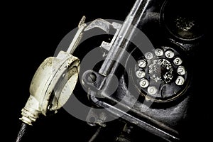 Close-up of an old black telephone