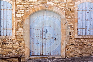 Close up of an old blue door.