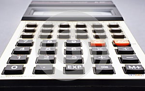 Close-up of old calculator selective focus