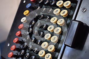 Close up of old cash register keys