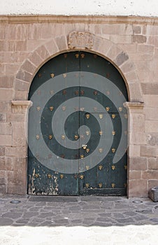 Close up of old catholic church facade in Cuzco Peru