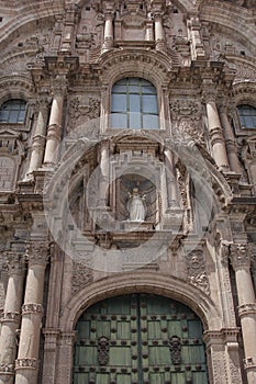 Close up of old catholic church facade in Cuzco Peru