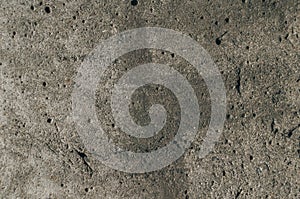 Close-up of the old concrete pavement. Dirty concrete floor. The texture of old concrete.