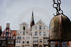 Close up of old Crane weight in front of historical building facade in Harbor Lueneburg, Lower Saxony,Germany