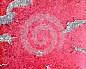 Close up Old dirty artificial red leather texture with ripped patterns for background