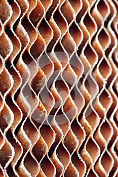 Close up of old dirty brown cellulose paper pad or evaporative c