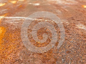 Close up of old, dirty and corroded metal plate with rusty surface, abstract background image of grungy, filthy and oxidized iron