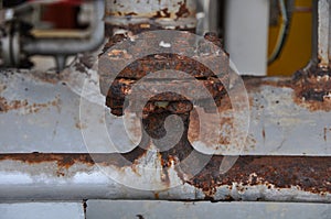 Close up old flange in oil and gas industry. Equipment in production process. Dust on equipment or flange