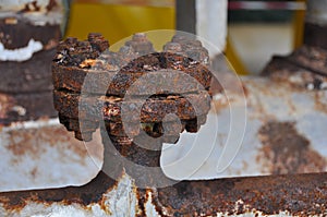 Close up old flange in oil and gas industry. Equipment in production process. Dust on equipment or flange photo