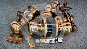 Close up from old golden colored door knobs