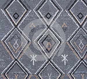 Close up of old grey homemade carpet texture