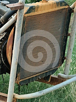 close up old grid iron of water pump machine texture