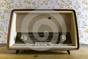 Close up of an old historical retro radio on a table