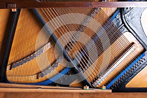 Close up of old inside element piano