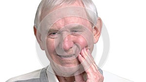 Close up old man having strong toothache.