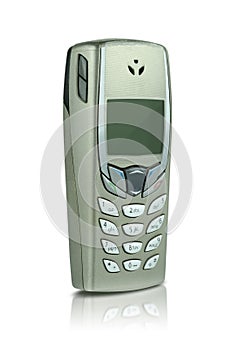 Close-up old metallic mobile phone or cellphone isolated on white background with clipping path.