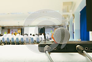 Close up old microphone wireless with box signal on the white table