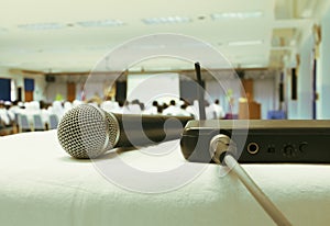 Close up old microphone wireless with box signal on the white table