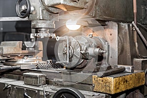 Close-up of old milling machine equipment at an industrial plant