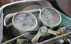 Close up of old motorcycle speed meter