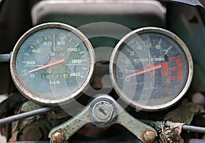 Close up of old motorcycle speed meter