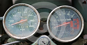 Close up of old motorcycle speed meter