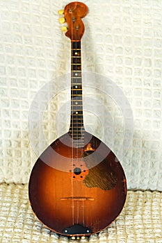 Close up of old musical instrument mandolin