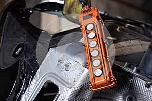 close-up old orange industrial elevator control panel