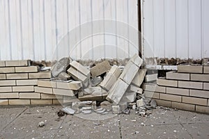 Close up of old ruined grey brick structure