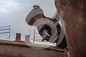 Close up old rusty anchor on old abandoned rusty ship