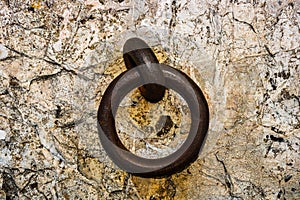 Close up of an old rusty door knocker
