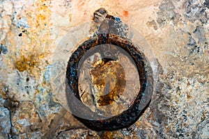 Close up of an old rusty door knocker