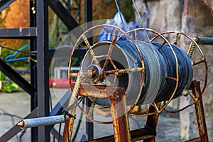 Close-up of old rusty reel cable