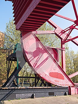 Close-up of an old rusty steel rolling lift bridge.